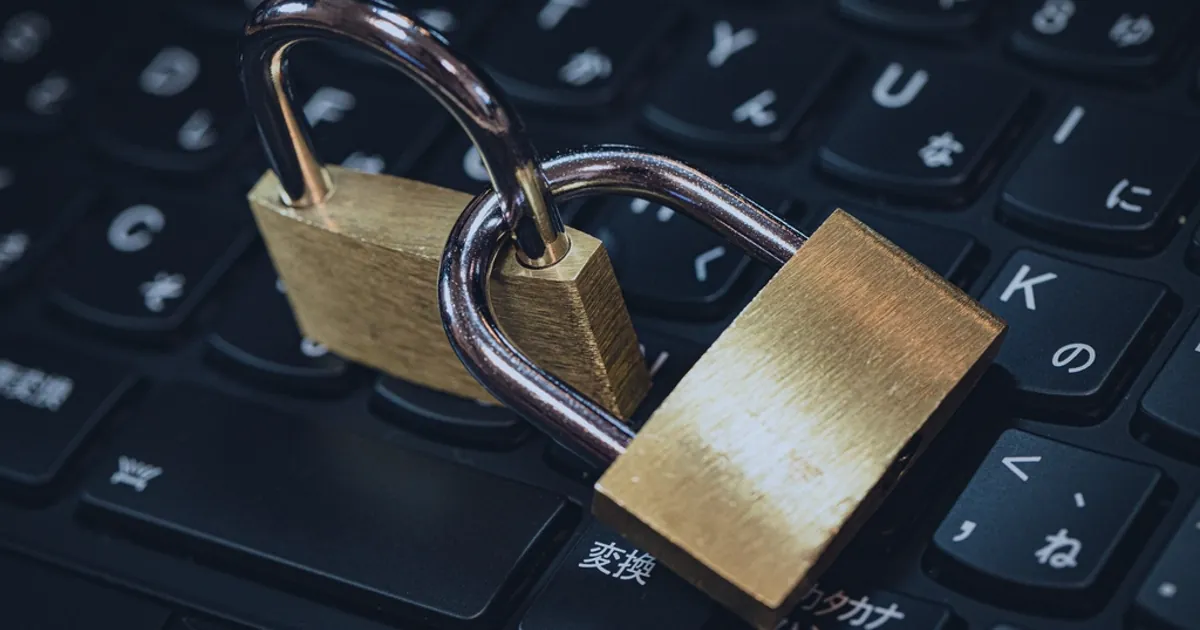 Padlocks on a laptop keyboard representing WordPress security